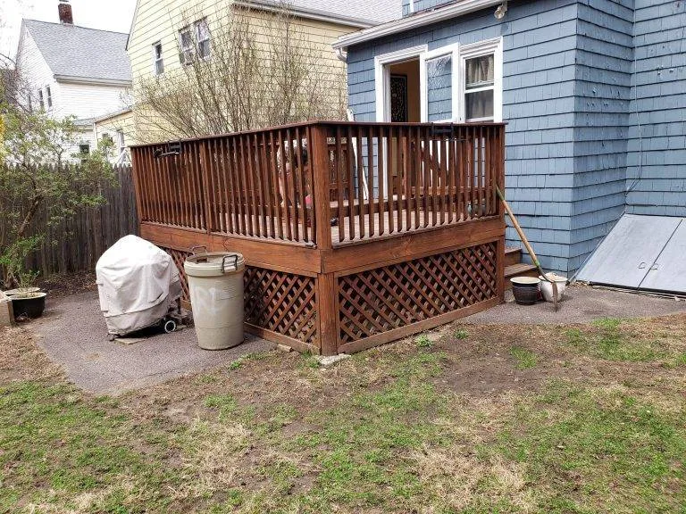 Photos of an old wooden deck that is about to be restored by boston hardwood decks.