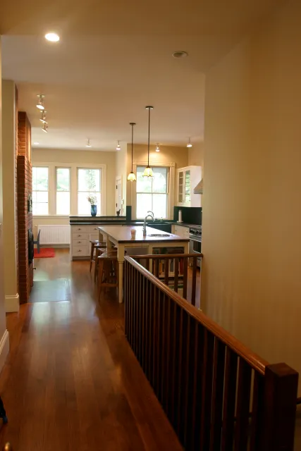 Renovated stair hall opening to the kitchen
