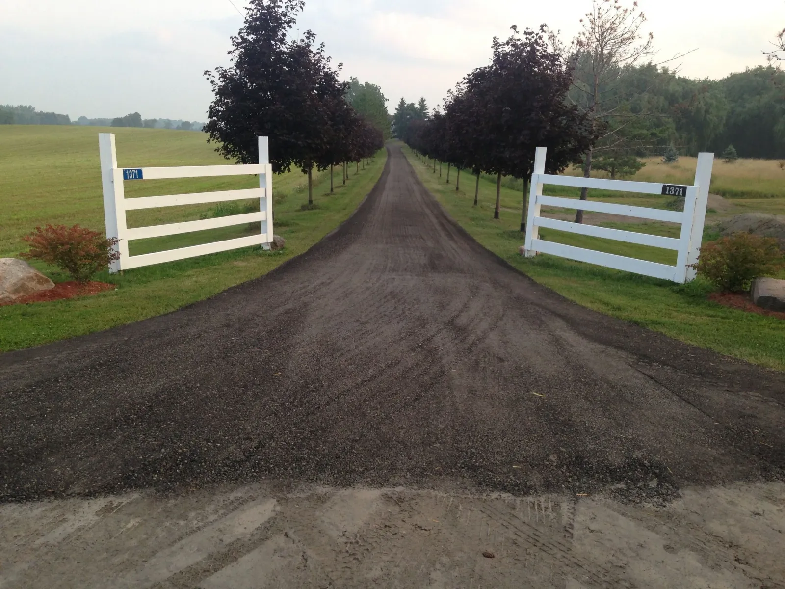 Driveway installation, new road, gravel, dirt, pavement, concrete, driveway maintenance.