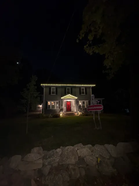 Christmas Lighting Service in Concord Massachusetts. The client requested the roofline and small peak to be completed for the service. MCE delivers quality results.