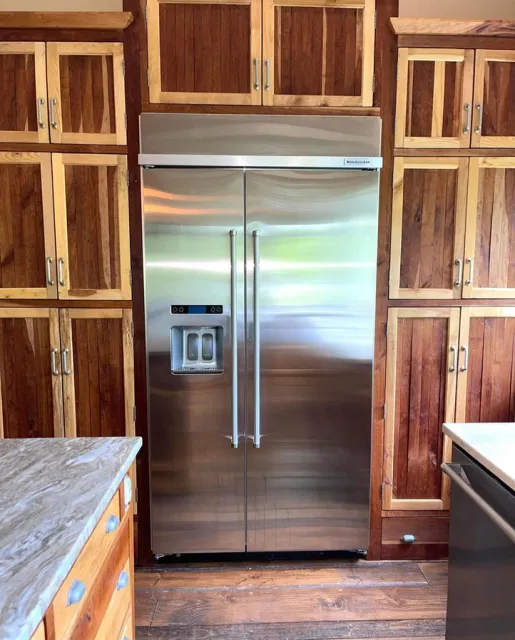 Modern stainless steel refrigerator in a home renovation