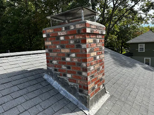 J E Fournier Chimney and Roofing Contractors work photo