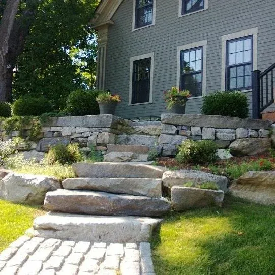 landscaped yard with customized stone staircase