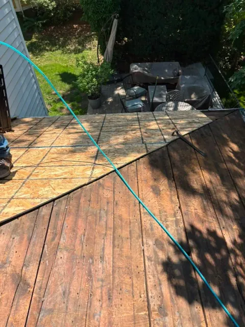 Before: old roof on the same house