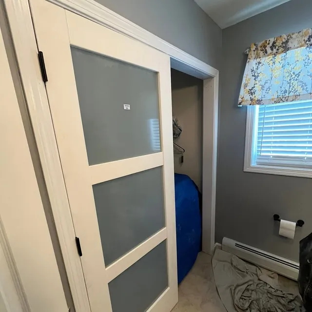 Interior sliding door with frosted glass panels