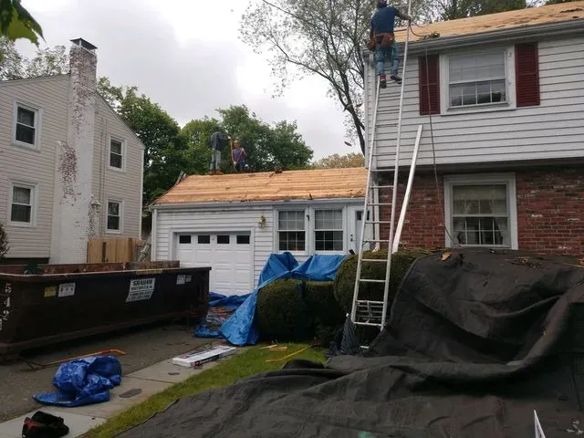 Peoples working on roof