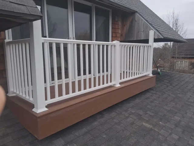 Completed rooftop deck — railing detail close-up