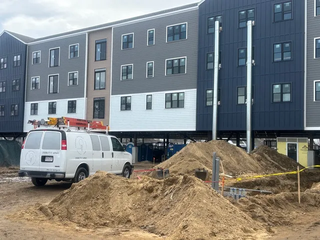 Active construction site — KEC van and excavation