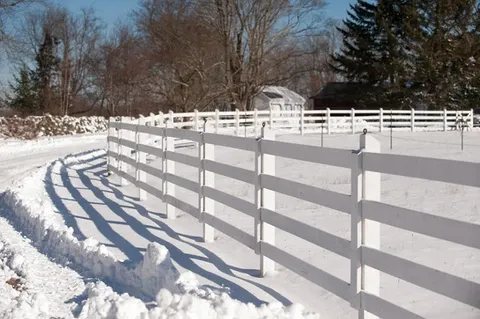 Custom white fence in winter