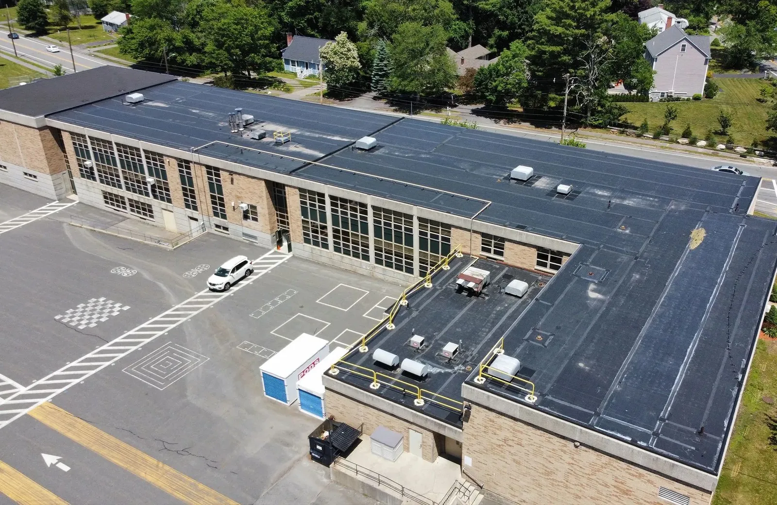 Aerial view of a completed industrial flat-roof project