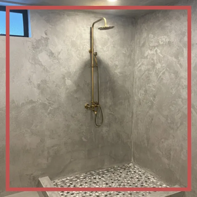 Renovated Bathroom Shower with custom stone and tilework