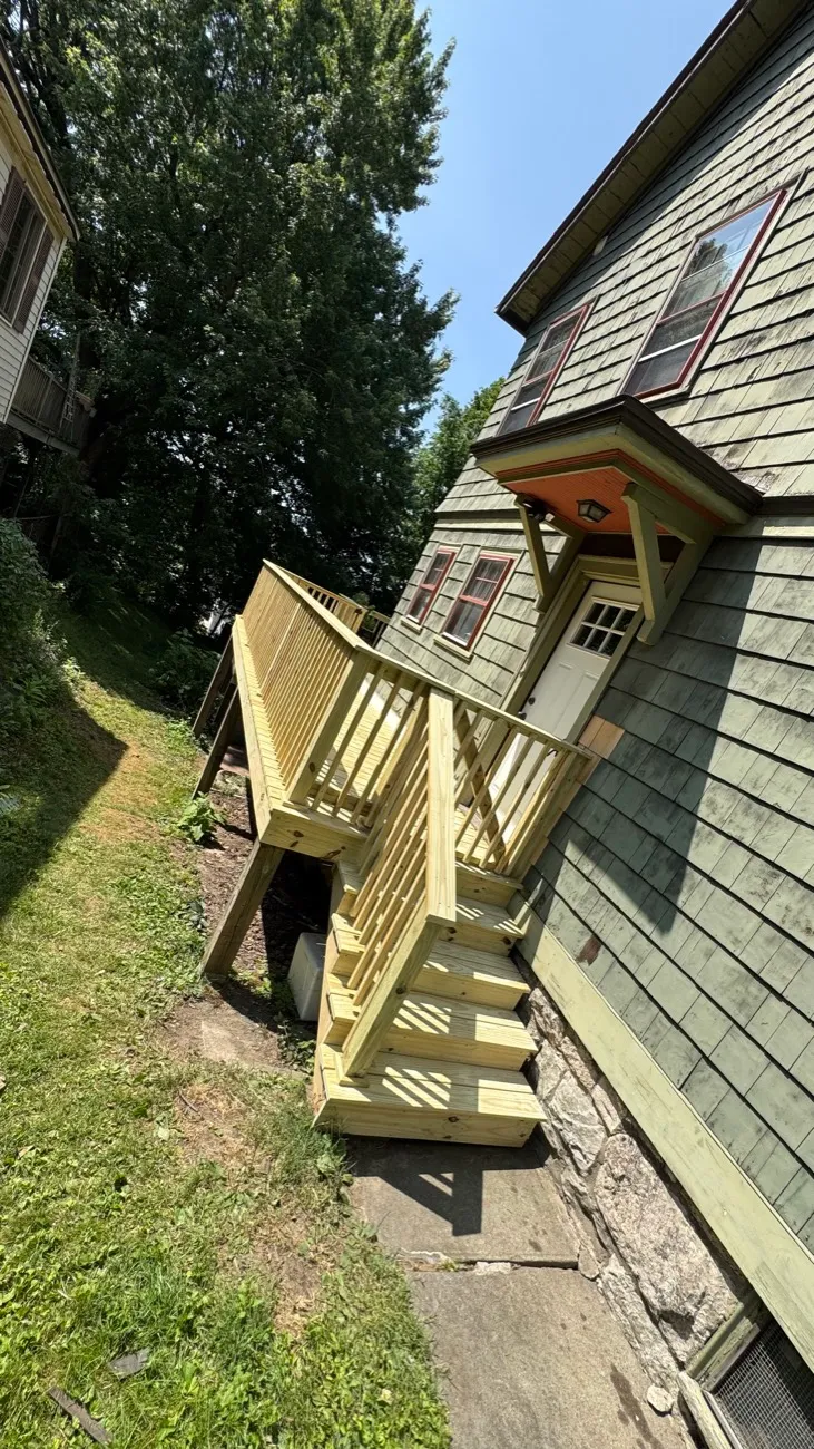 New pressure-treated stairs with lattice skirting