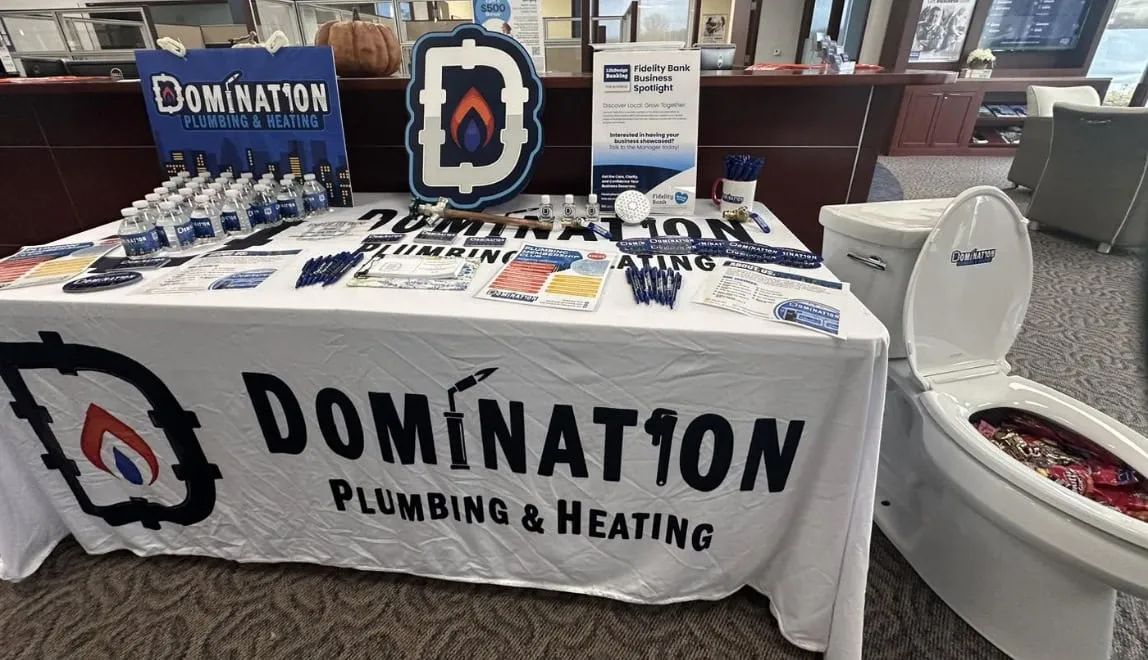 Domination Plumbing & Heating display at local event in the city of Leominster, Massachusetts.