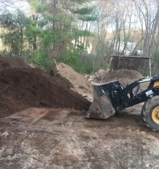 MovingTopSoil.JPG