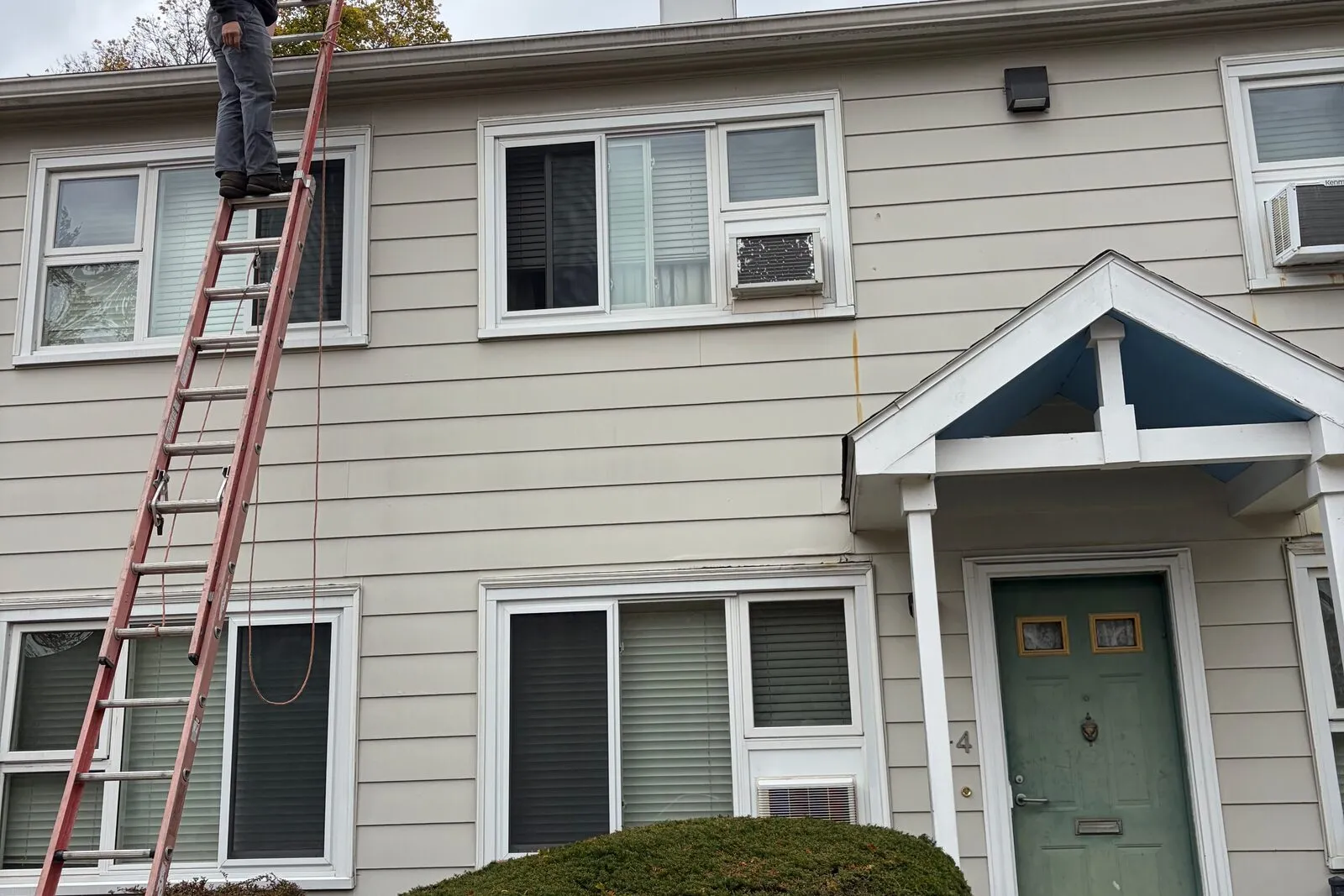 Chimney flashing and surrounding shingle replacement on a Medford residence.