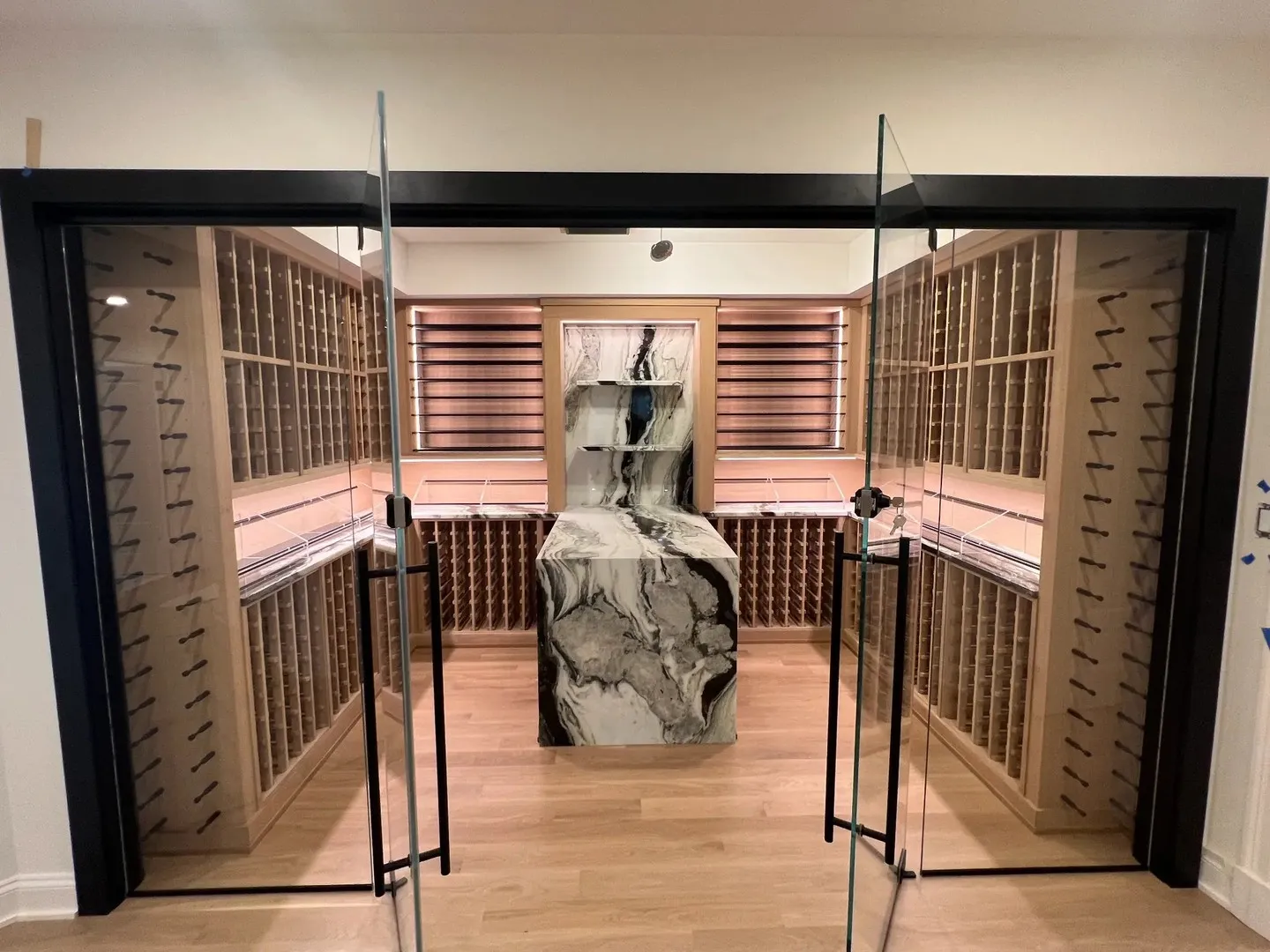 Scale, craft, and a stone slab that earns every second of attention.

This wine cellar speaks for itself.

#CabinJohnBuilders #LuxuryHomeBuilder #WashingtonDC #CustomHomes #WineCellar #WineRoom #CustomBuilt #Craftsmanship #HighEndHomes #CustomMillwork #StoneWork #DCBuilder