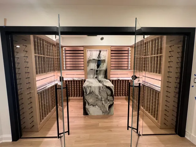 Scale, craft, and a stone slab that earns every second of attention.

This wine cellar speaks for itself.

#CabinJohnBuilders #LuxuryHomeBuilder #WashingtonDC #CustomHomes #WineCellar #WineRoom #CustomBuilt #Craftsmanship #HighEndHomes #CustomMillwork #StoneWork #DCBuilder