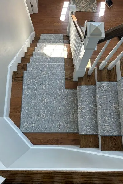 stair runner installation in Dedham ma with hardwood stairs