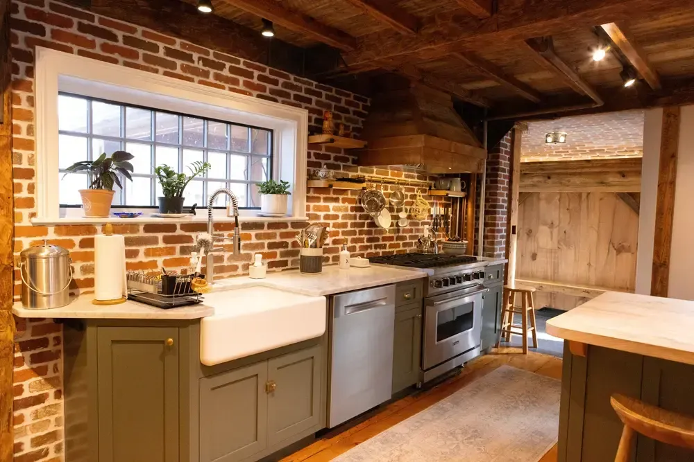 Home remodeling of a first floor kitchen in older homes featuring new windows and updated work areas done in the best way