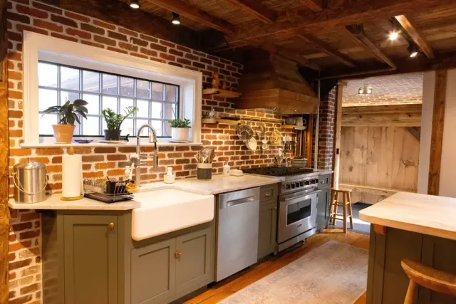 Home remodeling of a first floor kitchen in older homes featuring new windows and updated work areas done in the best way