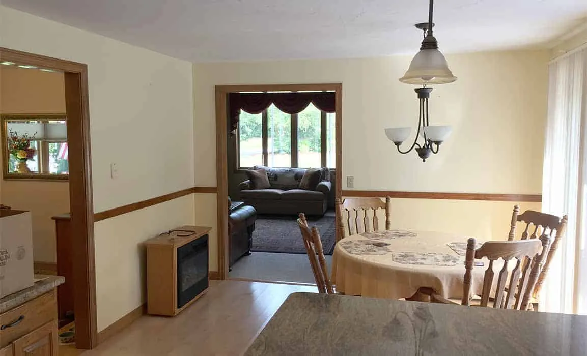Alternate view from living room to kitchen in newly opened up first-floor space.