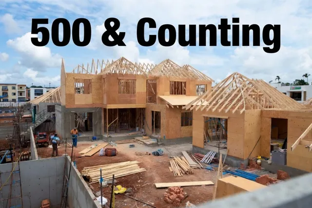 Graphic reading “500 & Counting” over a house under framing