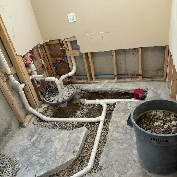 Under-slab drain lines during a bathroom rebuild