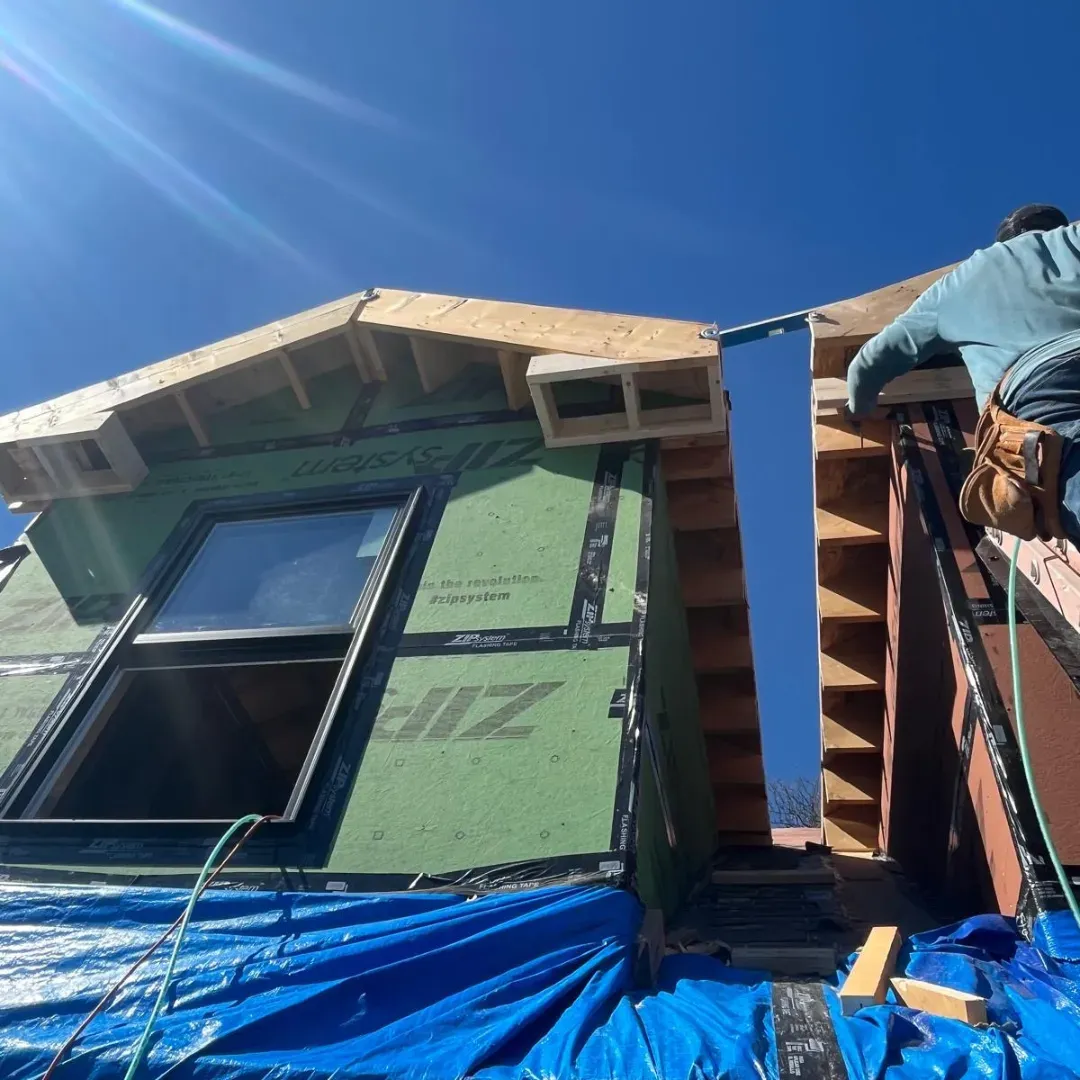 Home addition framing with Zip System sheathing in Medford, MA — Tinbercraft Construction