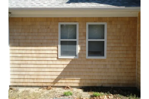 New siding, windows, corner board, rake board & exterior trim