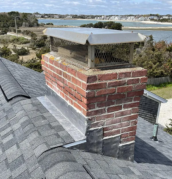 Chimney with flashing - First Class Roofing, Inc.