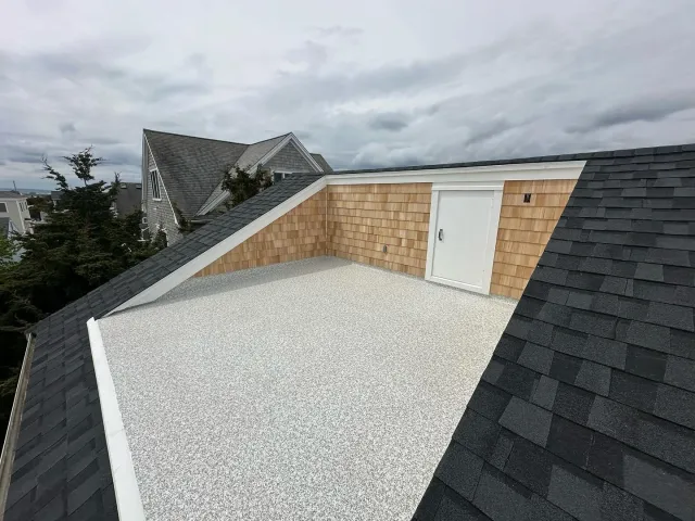 Perfect time for a facelift on this roof deck, summer is coming! @certainteed Climateflex shingles in Moire Black, @dectecvinyldecking in Copper colorway, and white cedar siding. Swipe to see the transformation  #roofing #shingleroofing #flatroof #ro