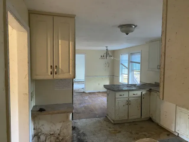 Kitchen cleared with clean cabinets and open space