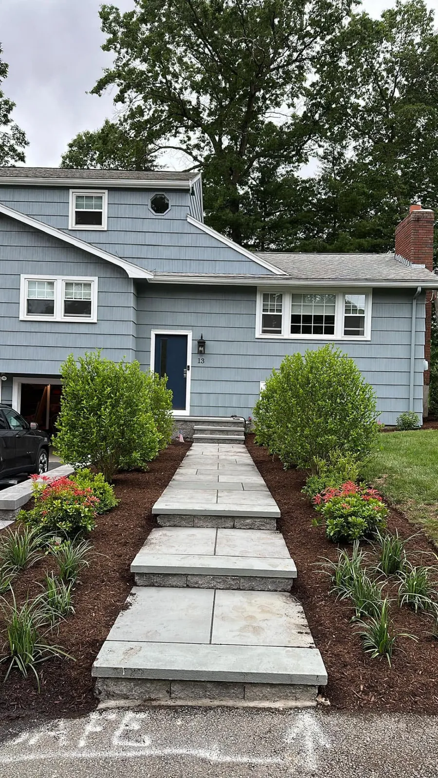 Bluestone walkway leading to a front entry