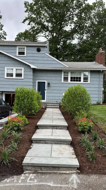 Bluestone walkway leading to a front entry