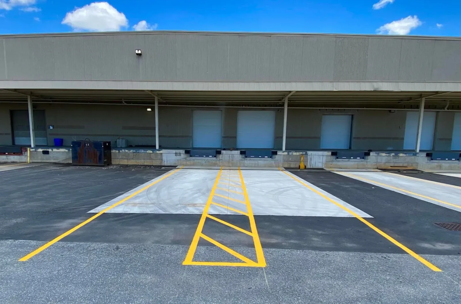 line striping, pavement markings, ada parking lot markings, west & central ma, ginger cat sealcoating