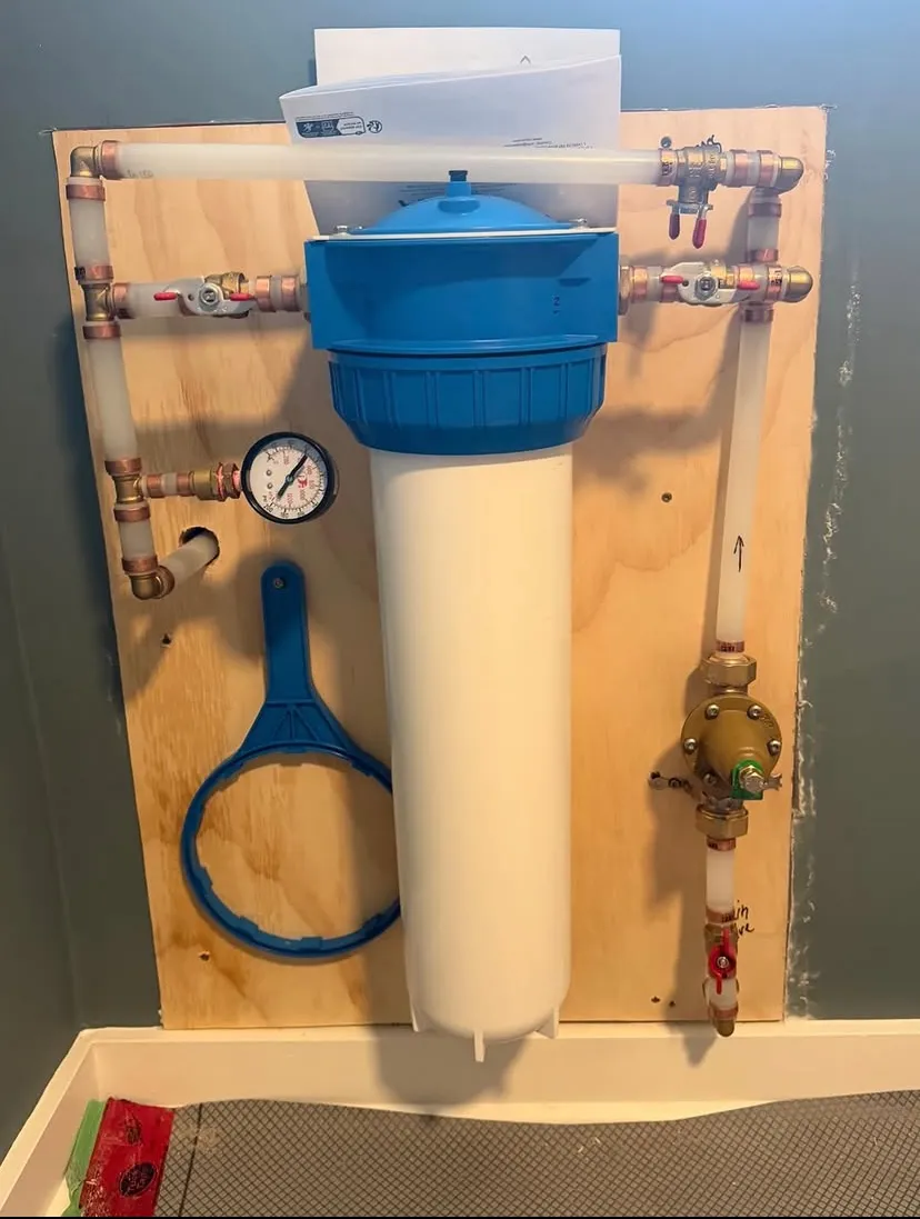 Whole-house water filtration system with copper piping and valves installed by Aroso Plumber Methuen