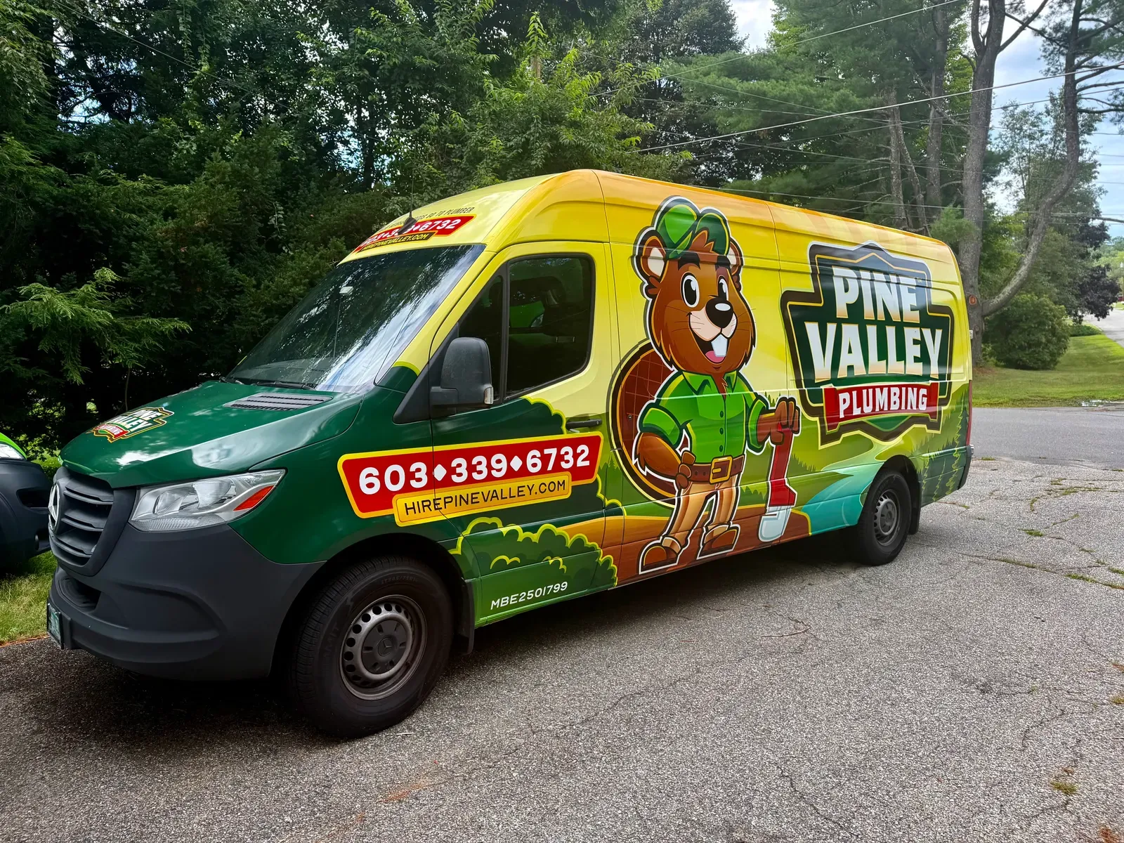 Pine Valley Plumbing truck parked on a sunny Merrimack, NH street