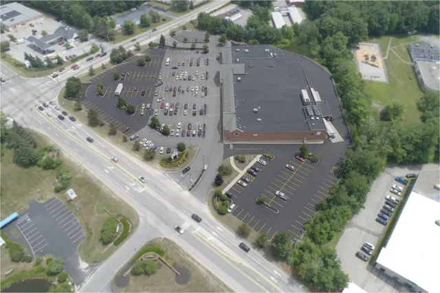 An aerial view of a parking lot.