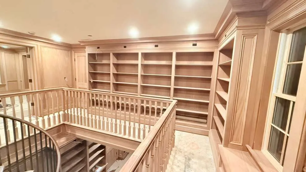 Upper level custom millwork and railing