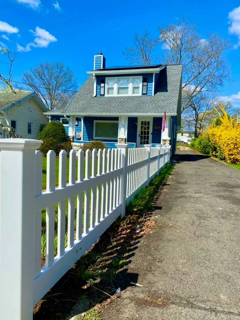 White vinyl fence installation