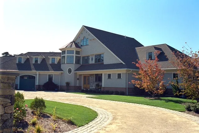 Wilder Residence — shingle-style home with circular cobblestone drive built by Chilton Development