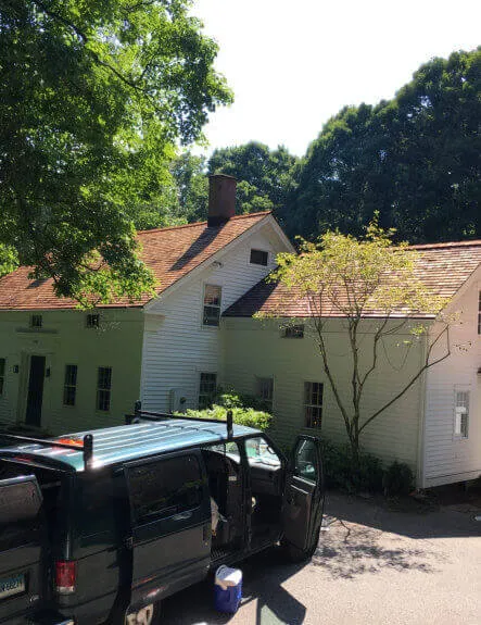 a man fixing a roof