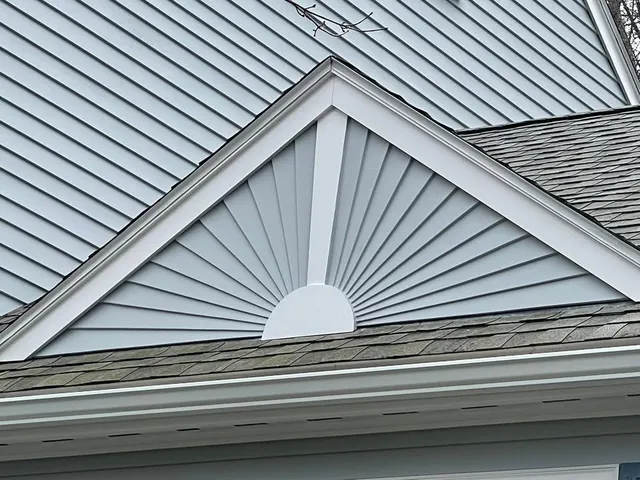 Completed gable siding with decorative fan detail