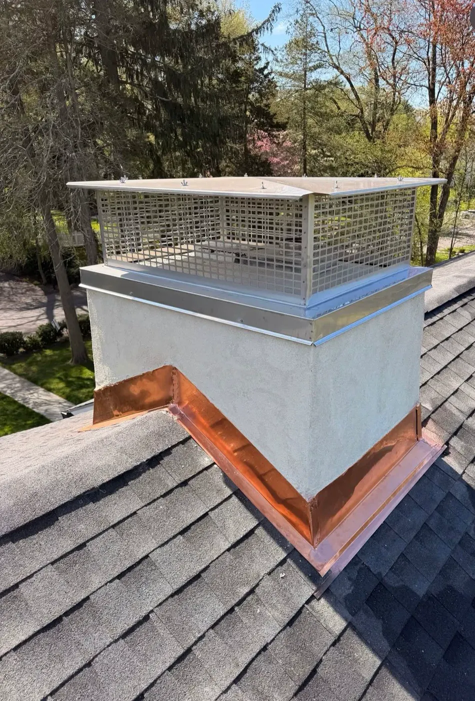 Stainless cap and copper flashing — Chimney Goat project