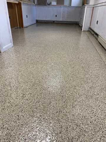 Beige epoxy flake floor in a residential garage