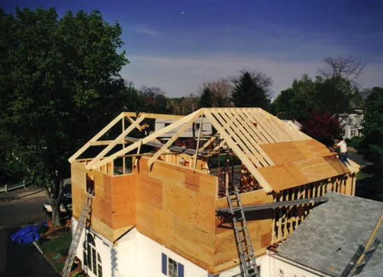 Existing roof opened for a full shed dormer