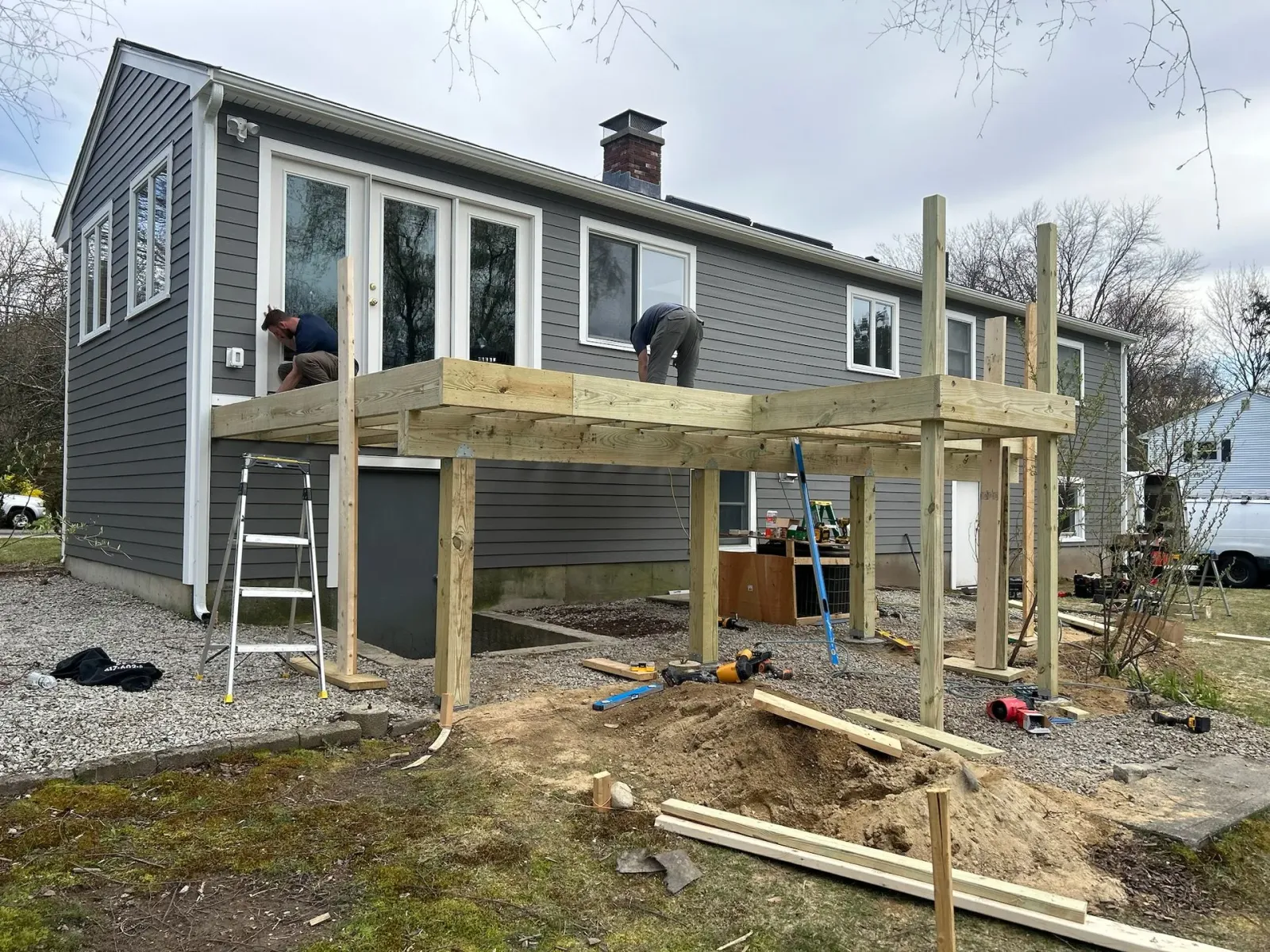 Renovated patio deck in shrewsbury massachusetts by licensed general contractor