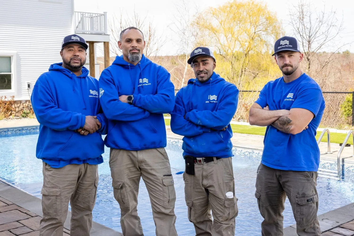 A group of men standing next to each other.