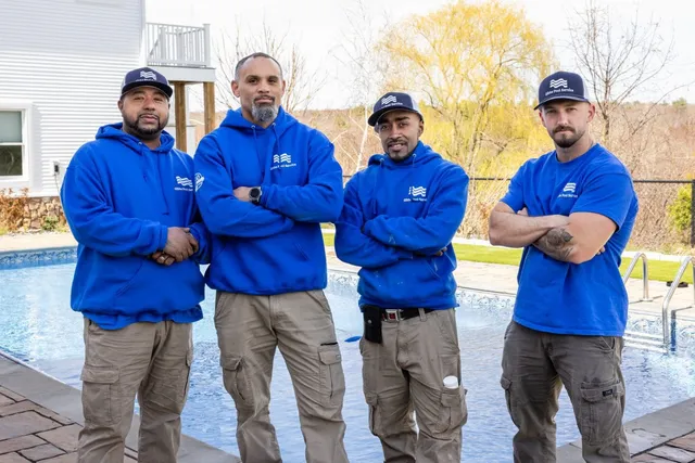 A group of men standing next to each other.