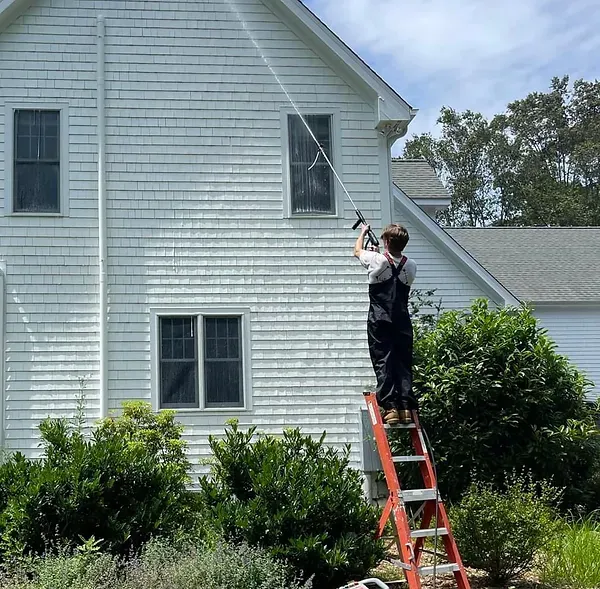 House Being Power Washed
